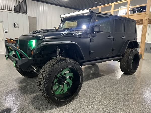 2013 Jeep Wrangler Sahara 3 Inch Lift Custom matte black paint, sold