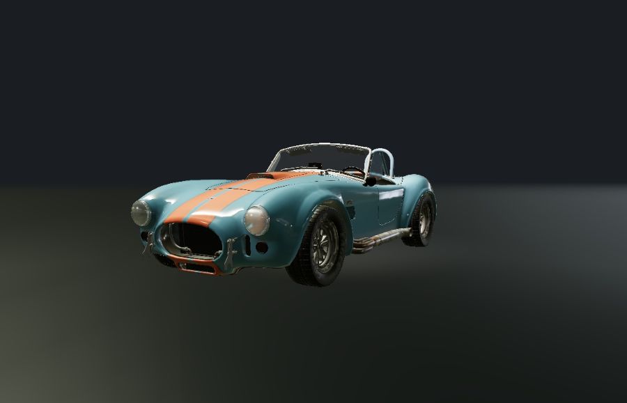 The car standing in the workshop.