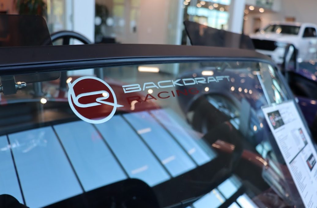 A Backdraft Racing mark on a windscreen — stand-in photography, see docs/content-ledger.md
