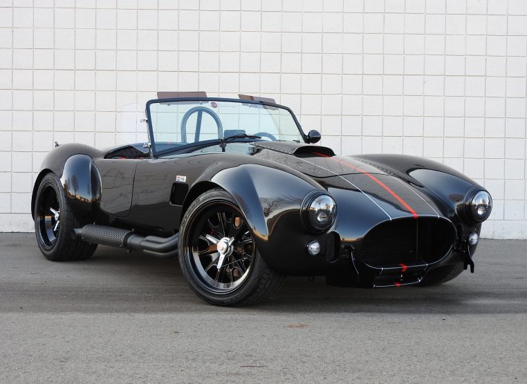 A black Cobra, front three-quarter — stand-in photography, see docs/content-ledger.md